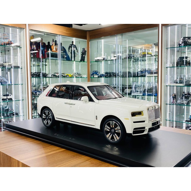 1/8 scale Amalgam Rolls-Royce Cullinan in a pristine white finish with luxurious maroon interior