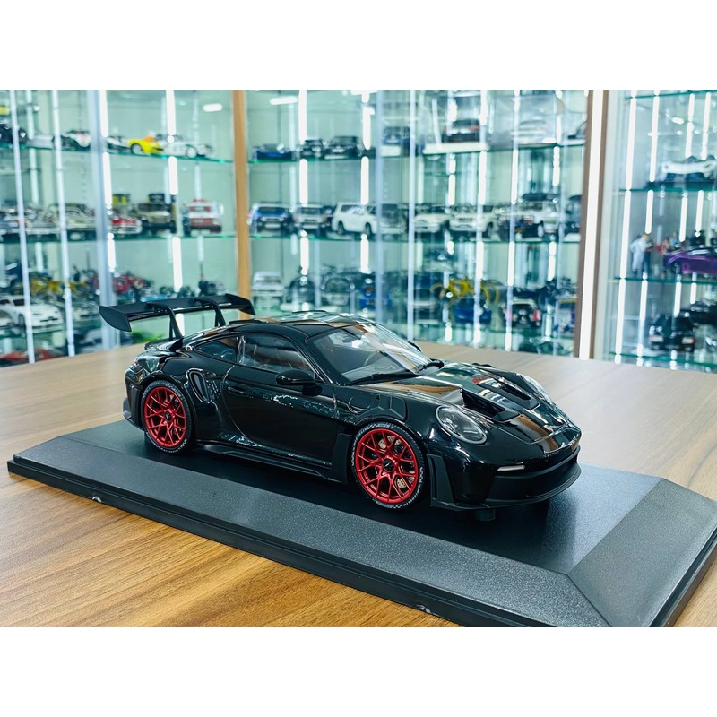 1/18 Diecast Minichamps Porsche 911 (992) GT3 RS 2023 in Black with Red Wheels