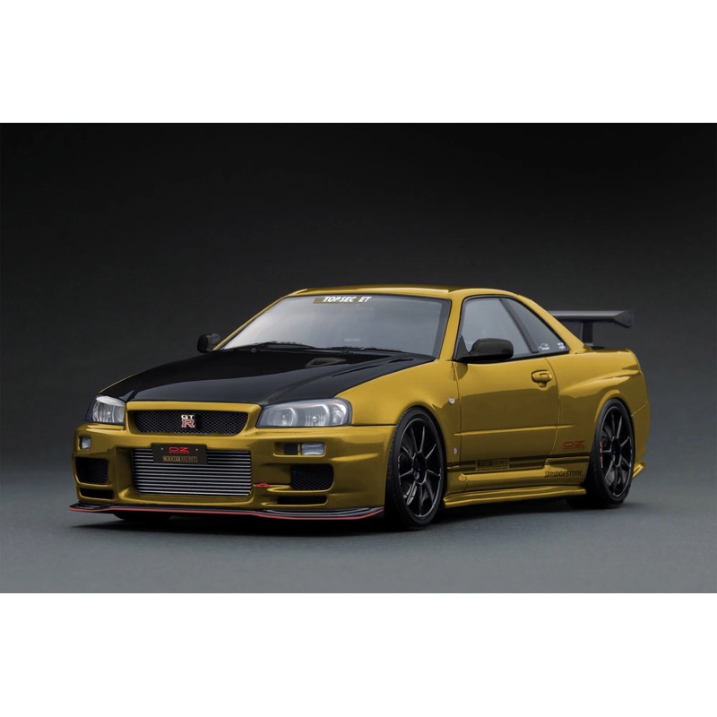 Ignition-Model Nissan Skyline GT-R R34 (BNR34) Top Secret 34GT-R RHD Gold w/ Carbon Fiber Hood 1:18