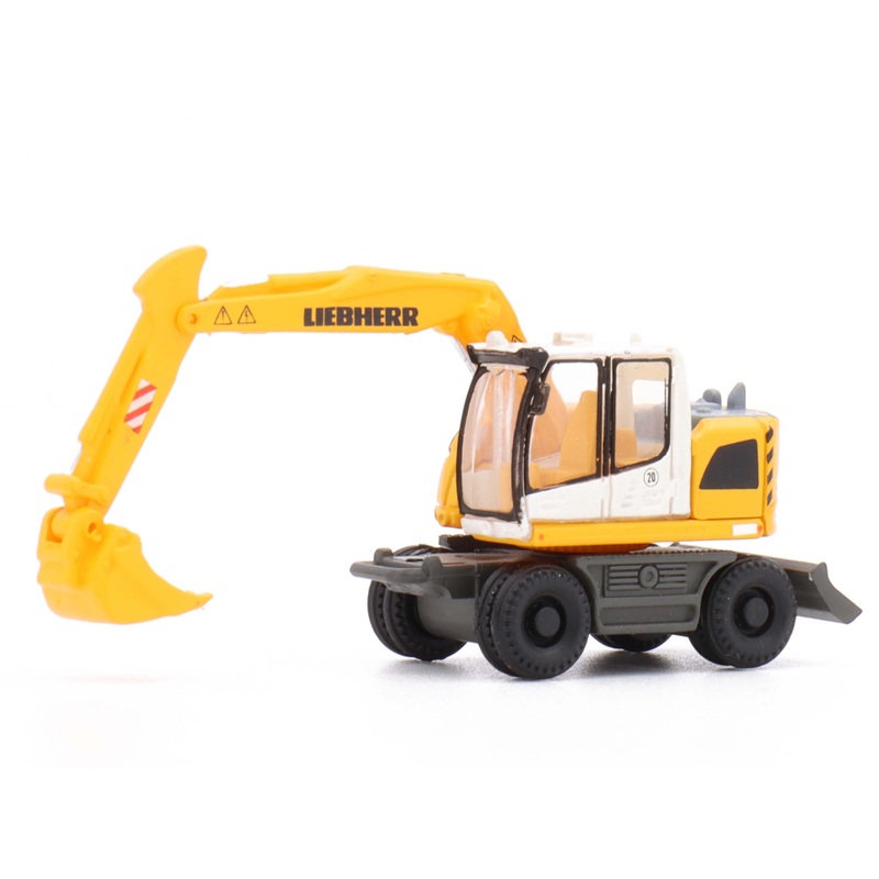 Liebherr compact excavator wheel with backhoe