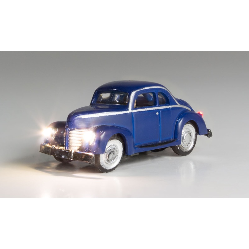 Classic car Coupe illuminated in blue