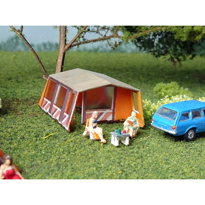 Bungalow tent with camping guests