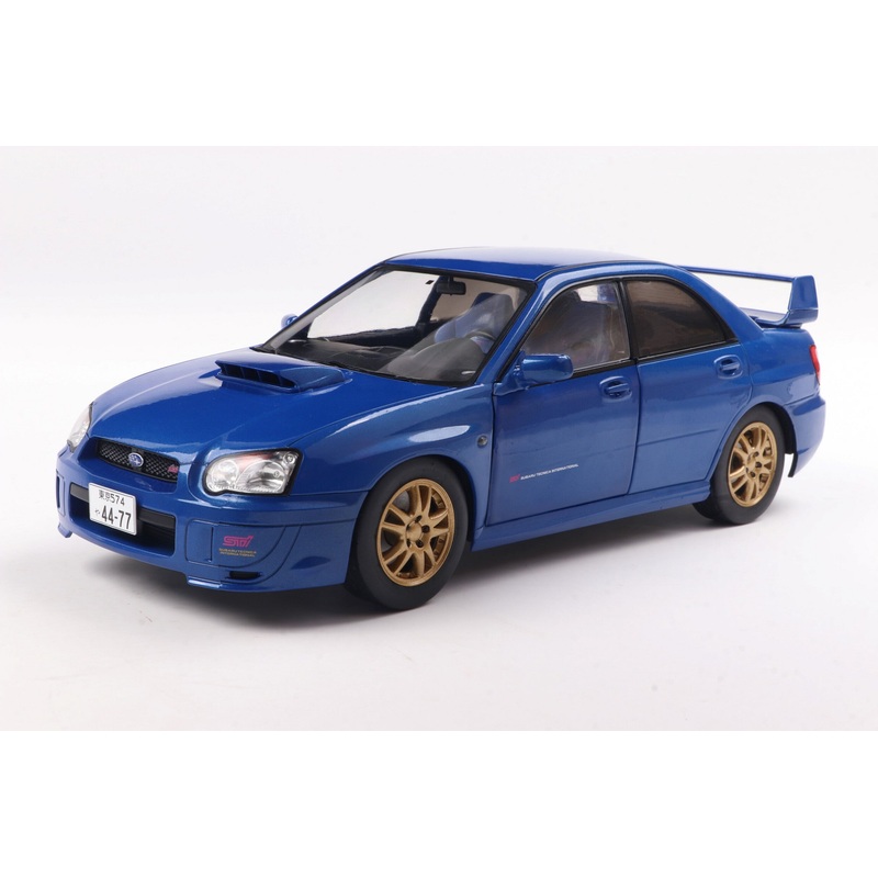 Solido 2003 Subaru WRX STi (GDB) Sonic Blue w/ Gold Wheels 1:18